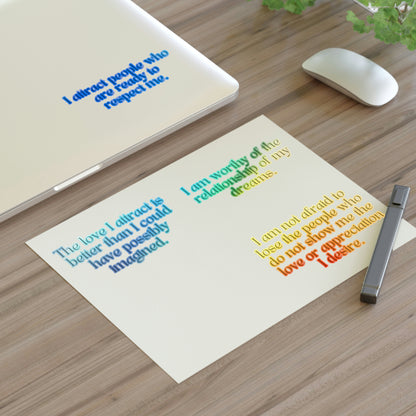 Holographic long affirmations for love sticker sheet on a laptop.